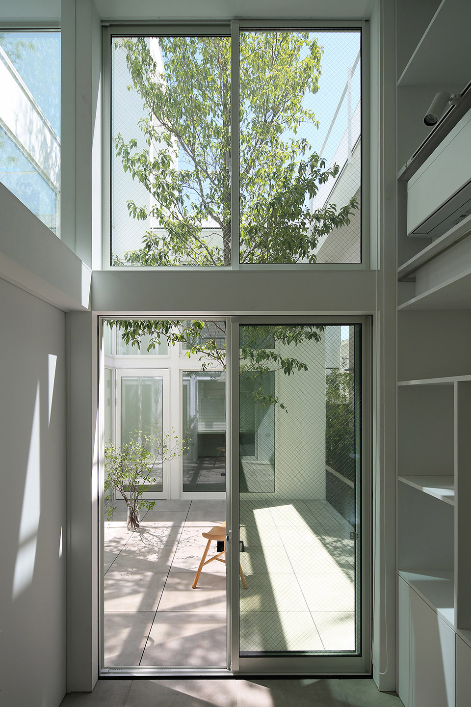 Courtyard House without Second Floor by Takuro Yamamoto Architects