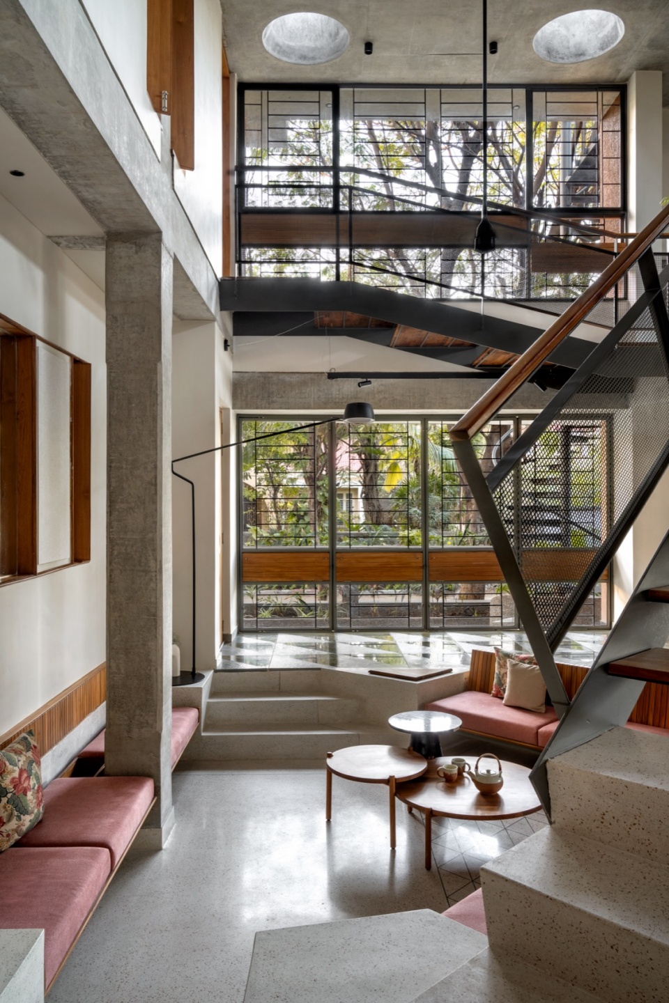 Informal living double volume ground floor north facade terra kota house by terra firma architects