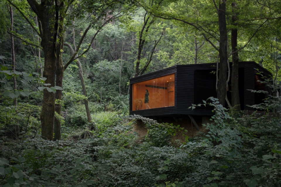 向外延申的木屋 aquatree resort healing cabin by uao
