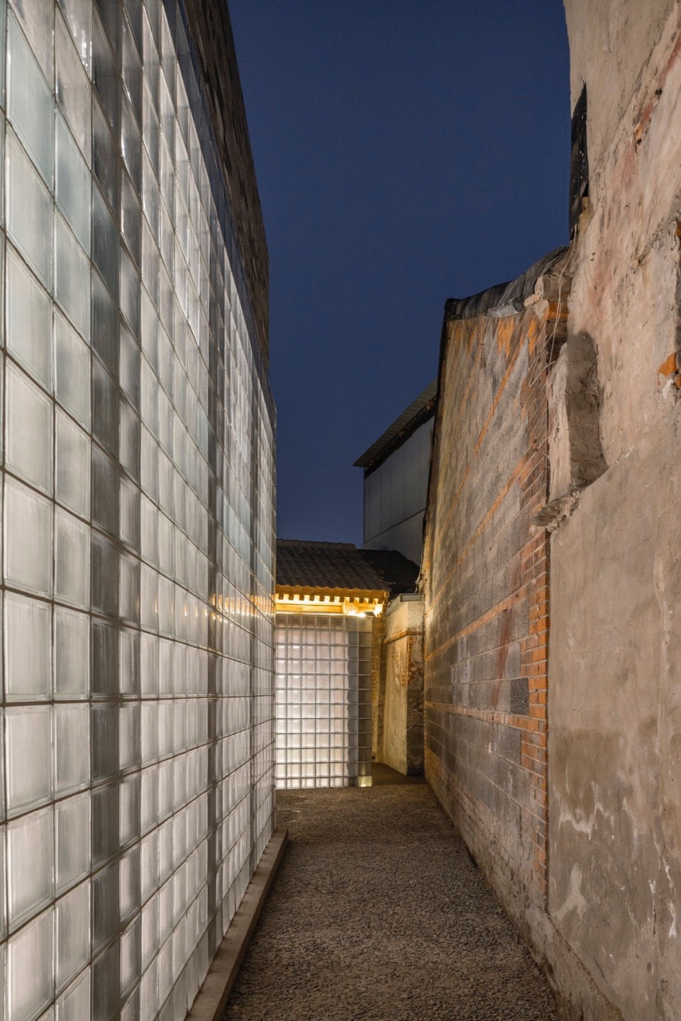 glass wall with lights photograph by Jin Weiqi