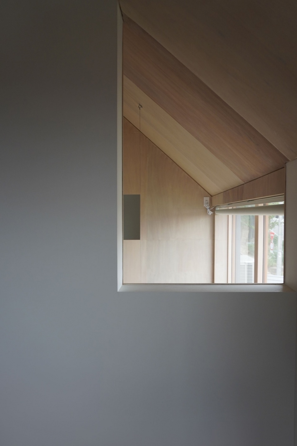 house with cross shaped earthen floor by fukei design