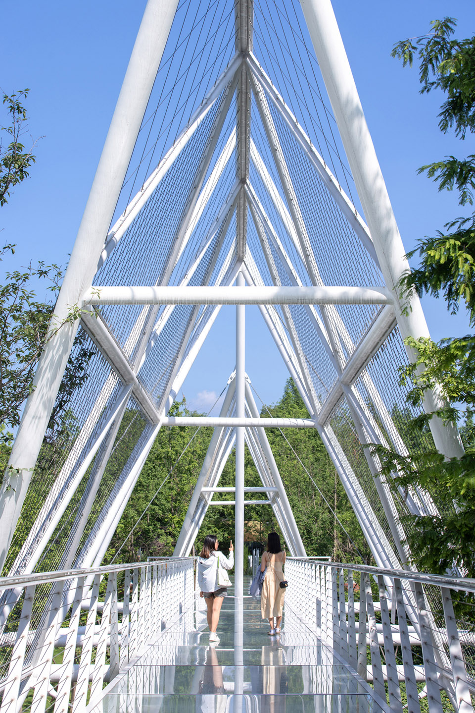 unarchitecte edenland pedestrian bridge in luxelakes by unarchitecte