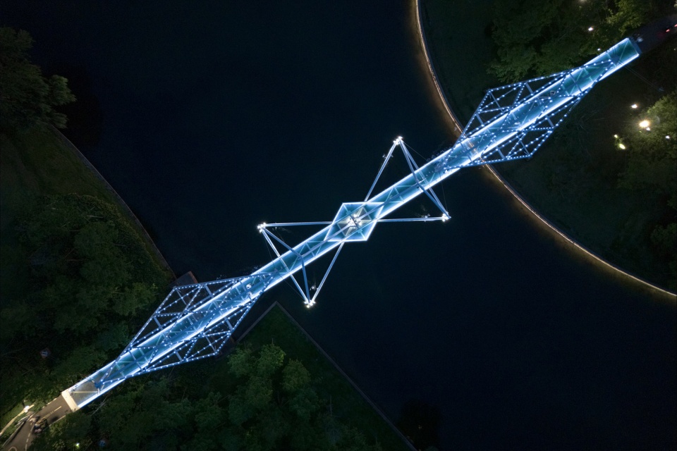 unarchitecte edenland pedestrian bridge in luxelakes by unarchitecte