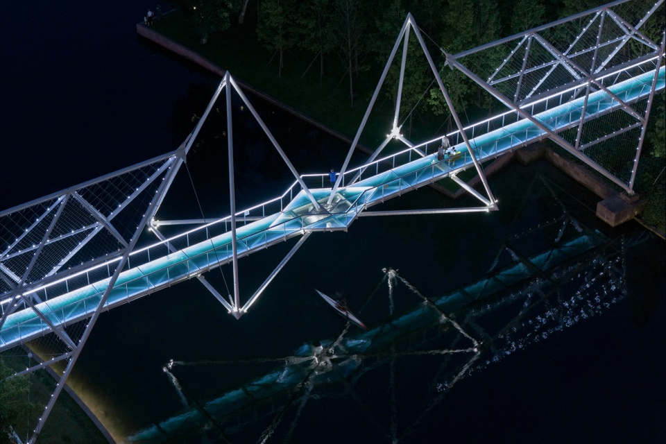 unarchitecte edenland pedestrian bridge in luxelakes by unarchitecte