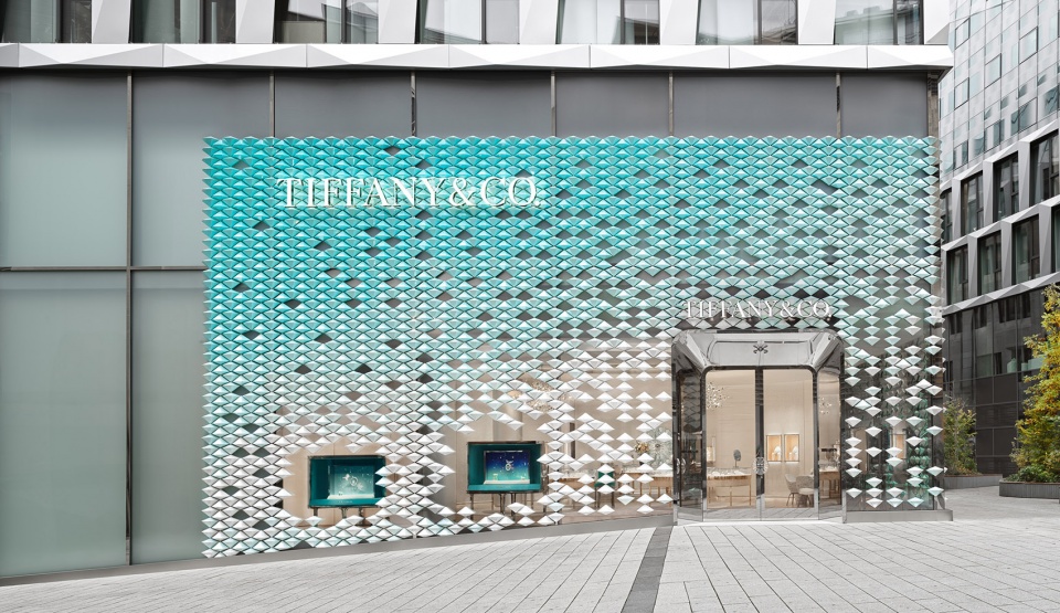 mvrdv designs facade of iridescent hand crafted ceramic diamonds for tiffany co store in stuttgart