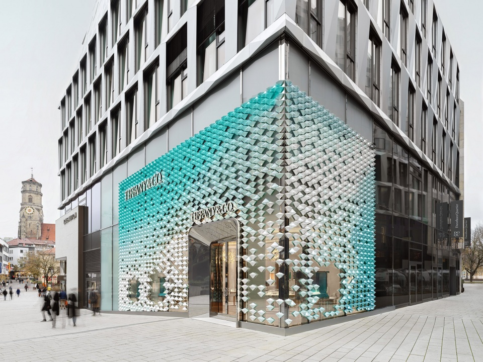 mvrdv designs facade of iridescent hand crafted ceramic diamonds for tiffany co store in stuttgart