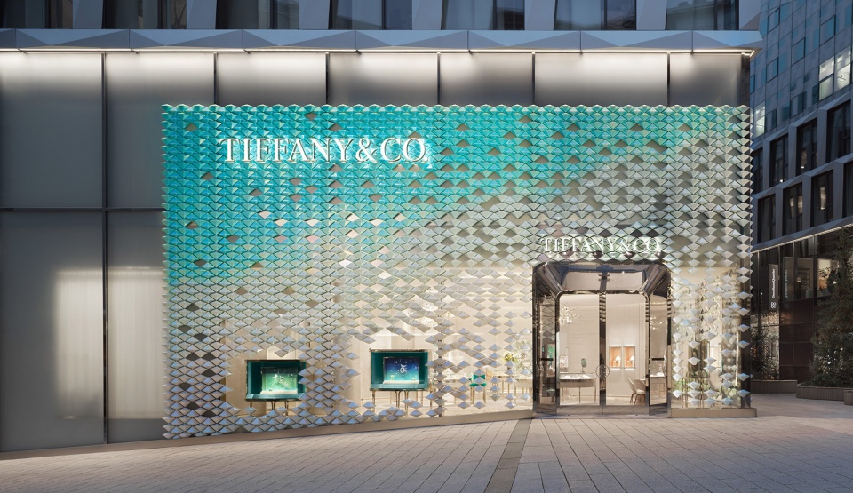 mvrdv designs facade of iridescent hand crafted ceramic diamonds for tiffany co store in stuttgart