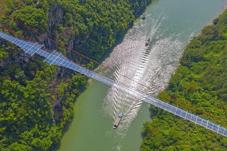 glass bridge in huangchuan three gorges scenic area china by uad
