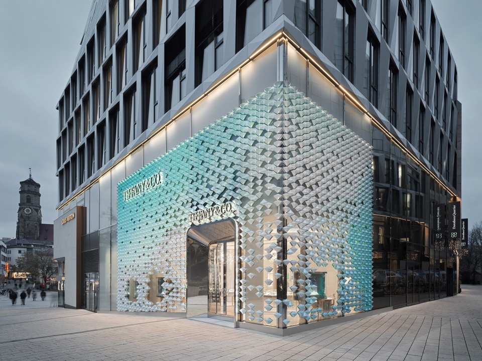 mvrdv designs facade of iridescent hand crafted ceramic diamonds for tiffany co store in stuttgart