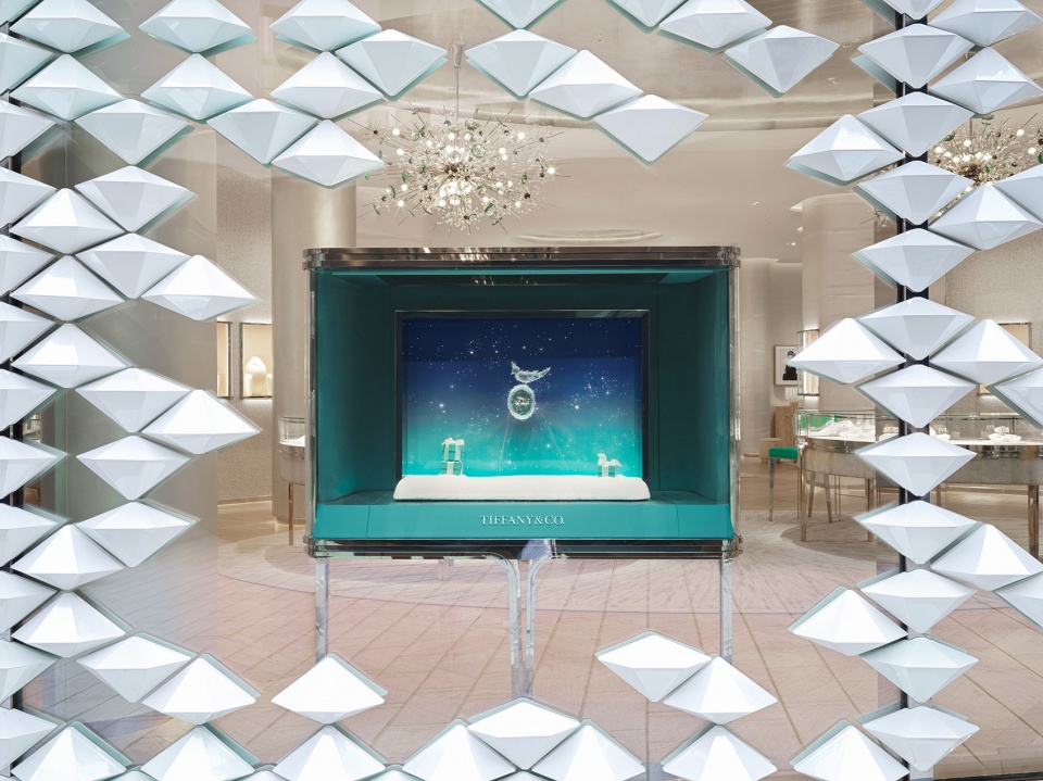 mvrdv designs facade of iridescent hand crafted ceramic diamonds for tiffany co store in stuttgart