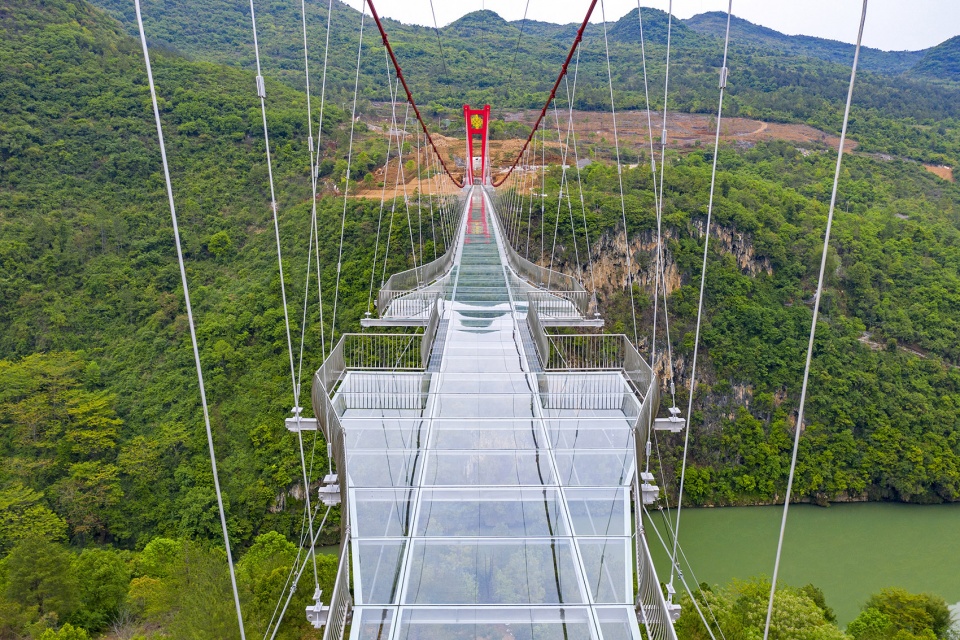 glass bridge in huangchuan three gorges scenic area china by uad