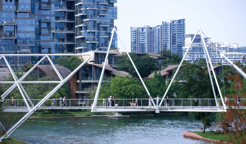 unarchitecte edenland pedestrian bridge in luxelakes by unarchitecte