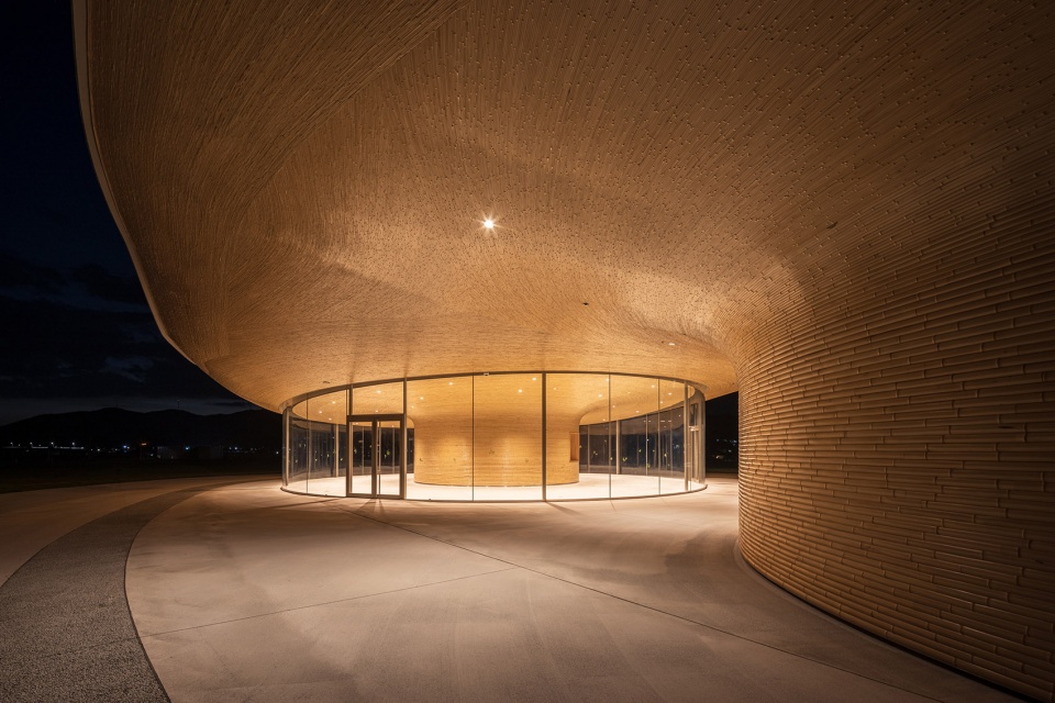 mabi reconstruction disaster prevention park bamboo gate by kengo kuma