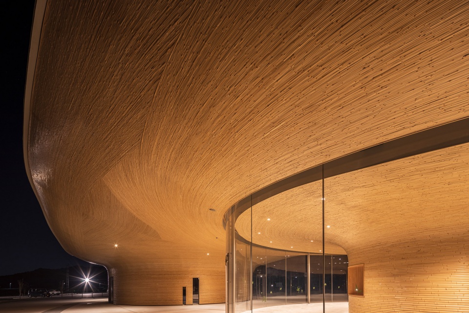 mabi reconstruction disaster prevention park bamboo gate by kengo kuma