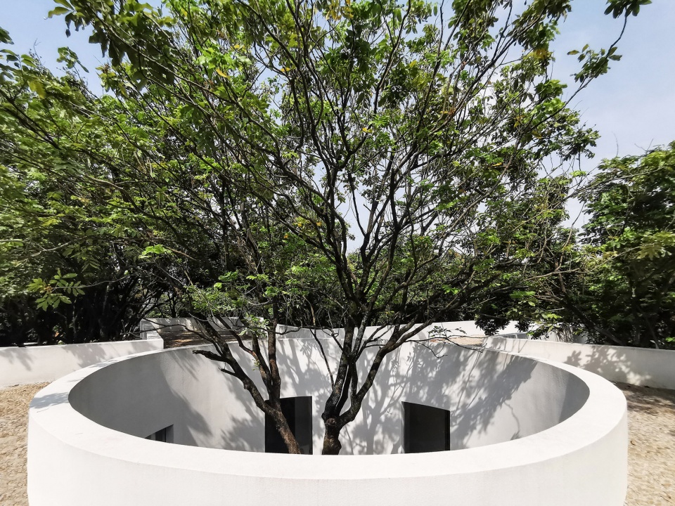 courtyard under longan trees by spacework architects