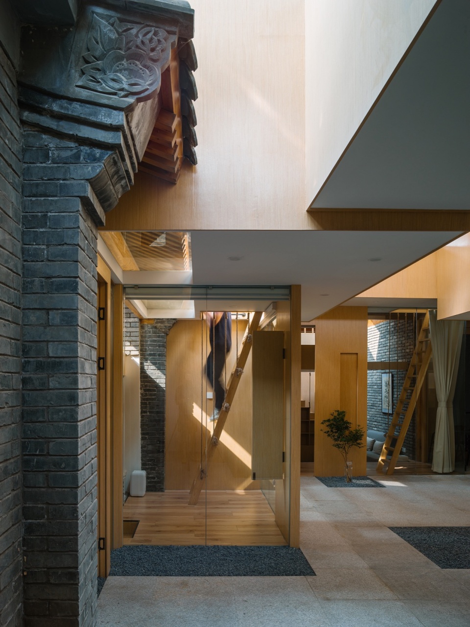 Tiled roof courtyard by Beijing Jimei Survey and Design Co Ltd