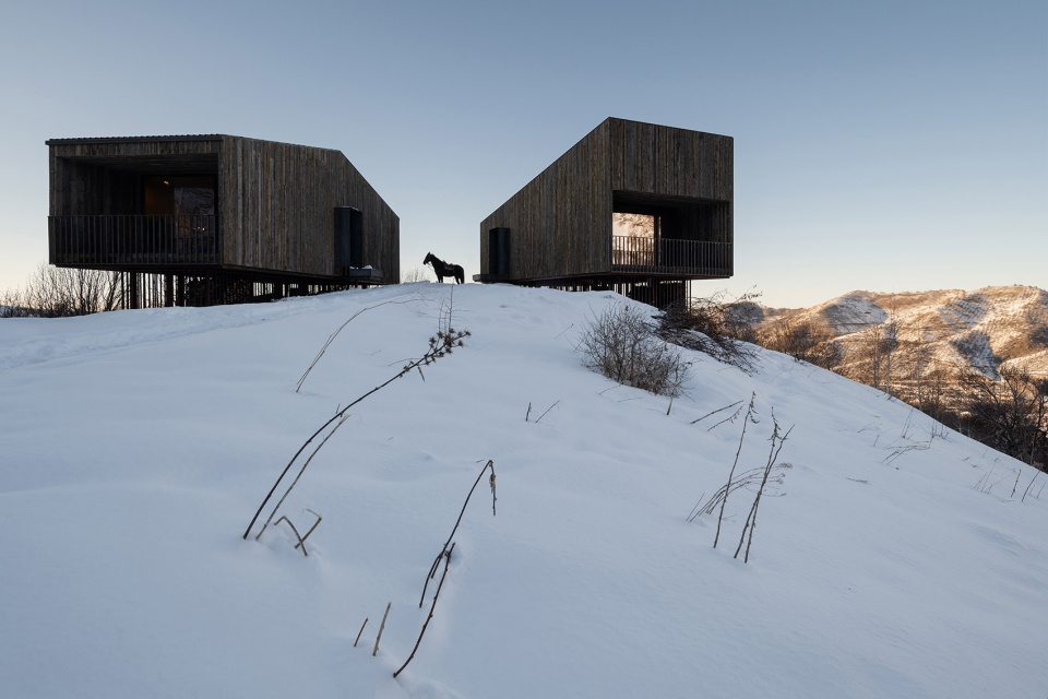 aum cabins amid mountainscape in kazakhstan by arthur kariev architects