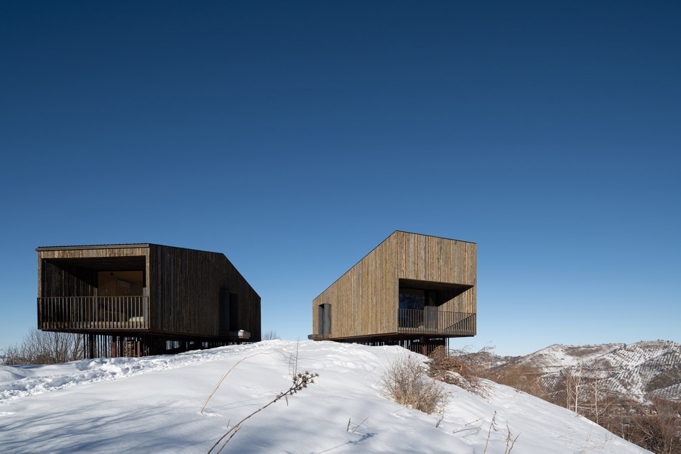 aum cabins amid mountainscape in kazakhstan by arthur kariev architects