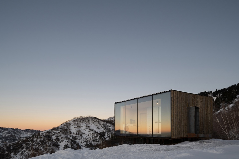 aum cabins amid mountainscape in kazakhstan by arthur kariev architects
