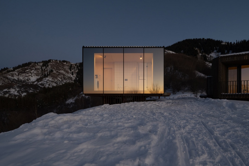 aum cabins amid mountainscape in kazakhstan by arthur kariev architects