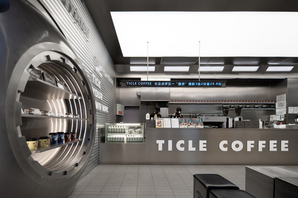 stainless steel and concrete intertwined ticle coffee series by daga architecture