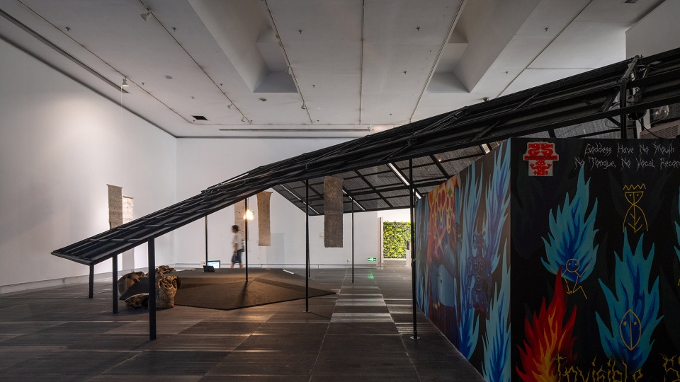a settlement with sloping roofs exhibition design by atelier waterside