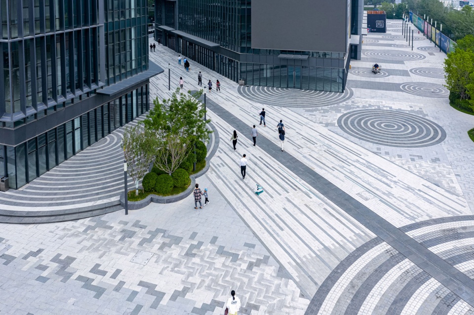 rongchuang office tower plaza by ballistic architecture machine bam