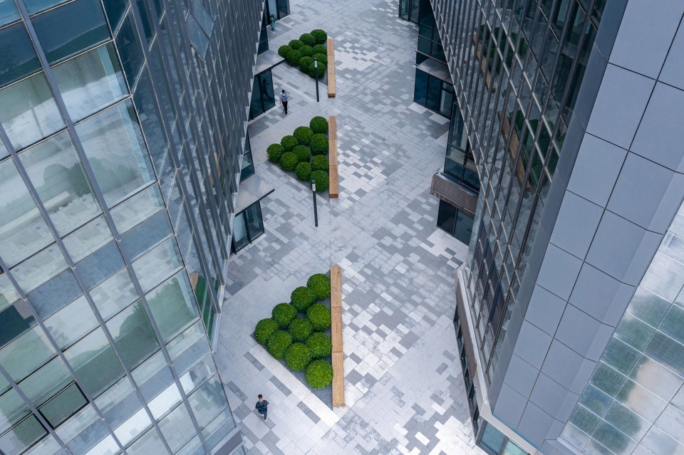 rongchuang office tower plaza by ballistic architecture machine bam
