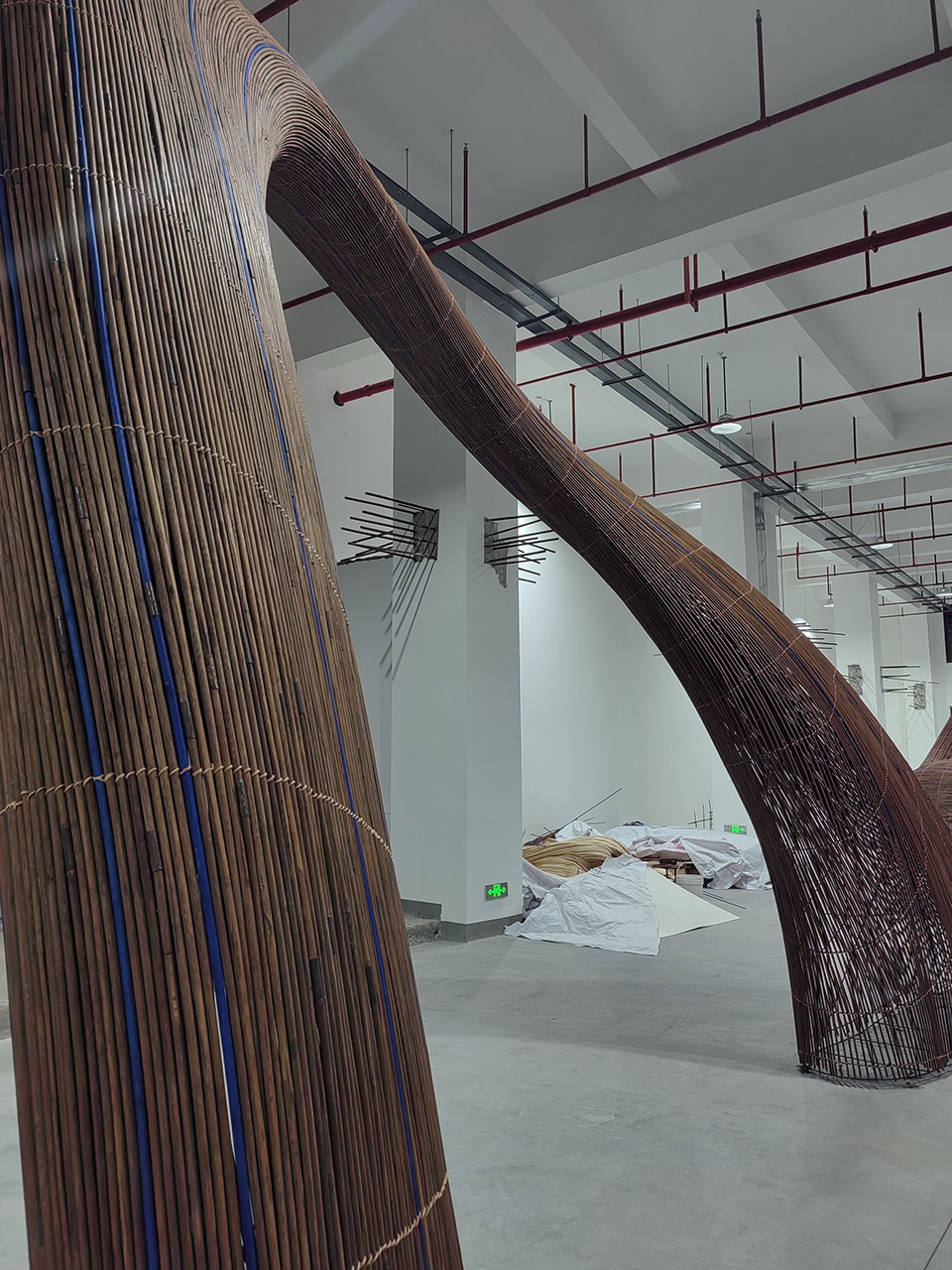 the bamboo chain weaving installation by zyeen