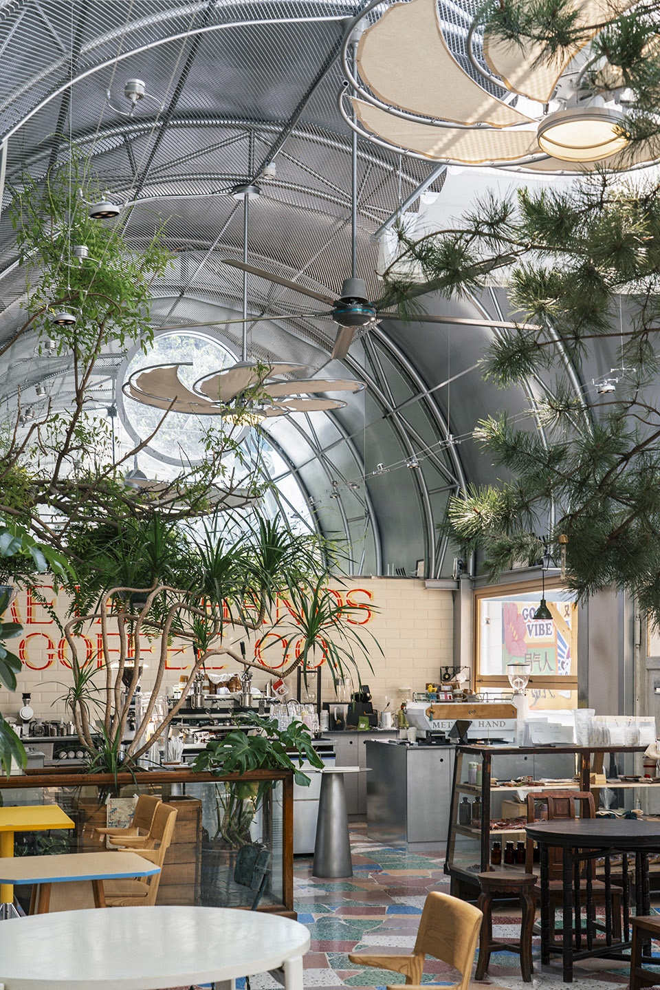 metal hands coffee youyi store by sa architects