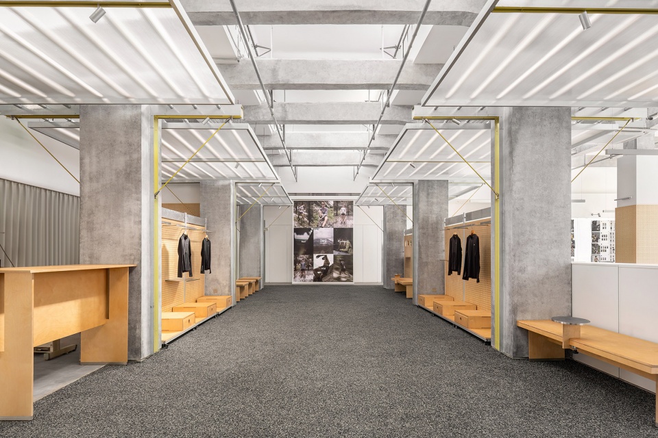 swiss outdoor apparel brand showroon hq by aam architects