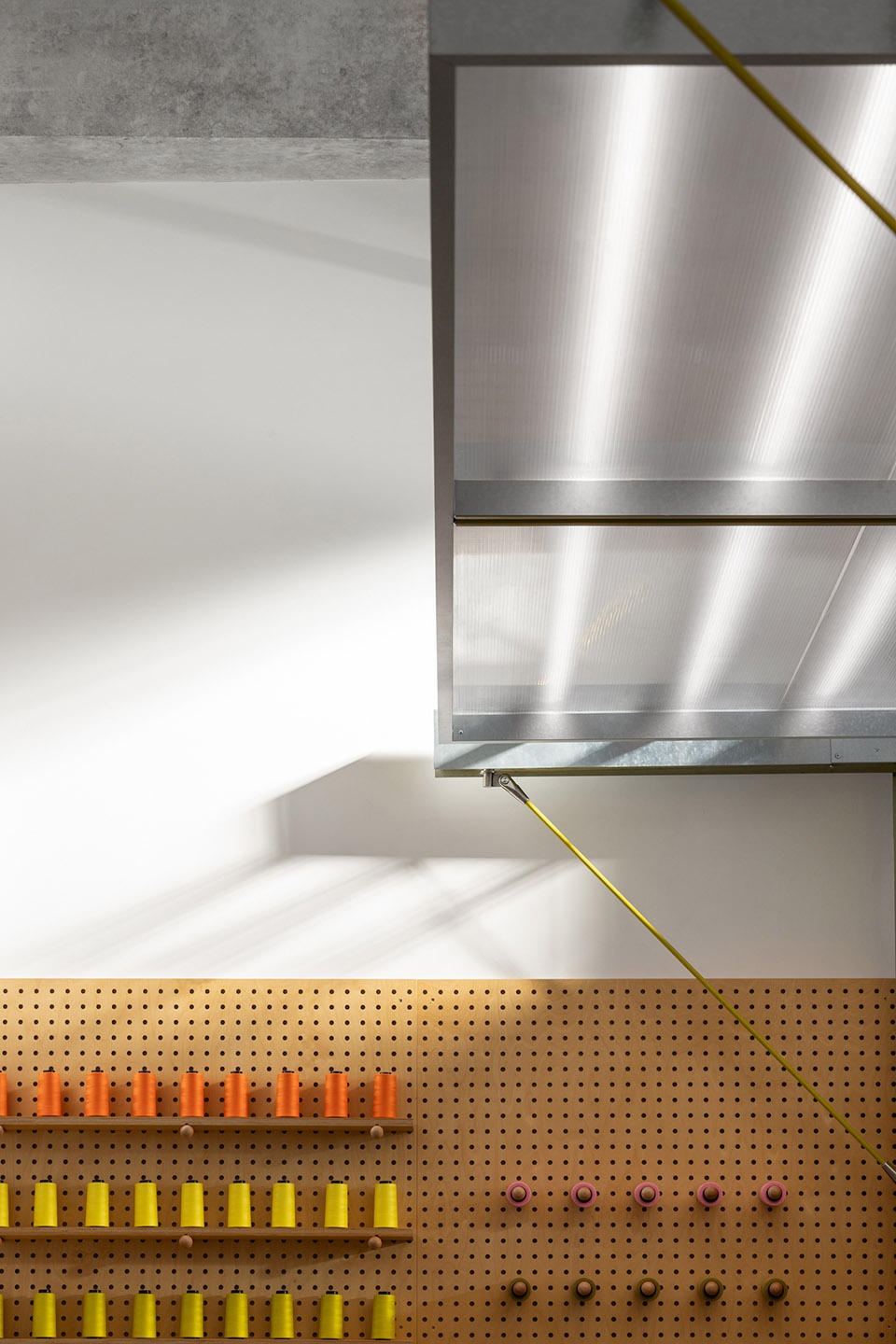 swiss outdoor apparel brand showroon hq by aam architects