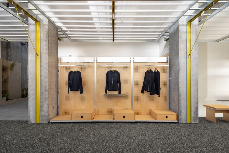 swiss outdoor apparel brand showroon hq by aam architects