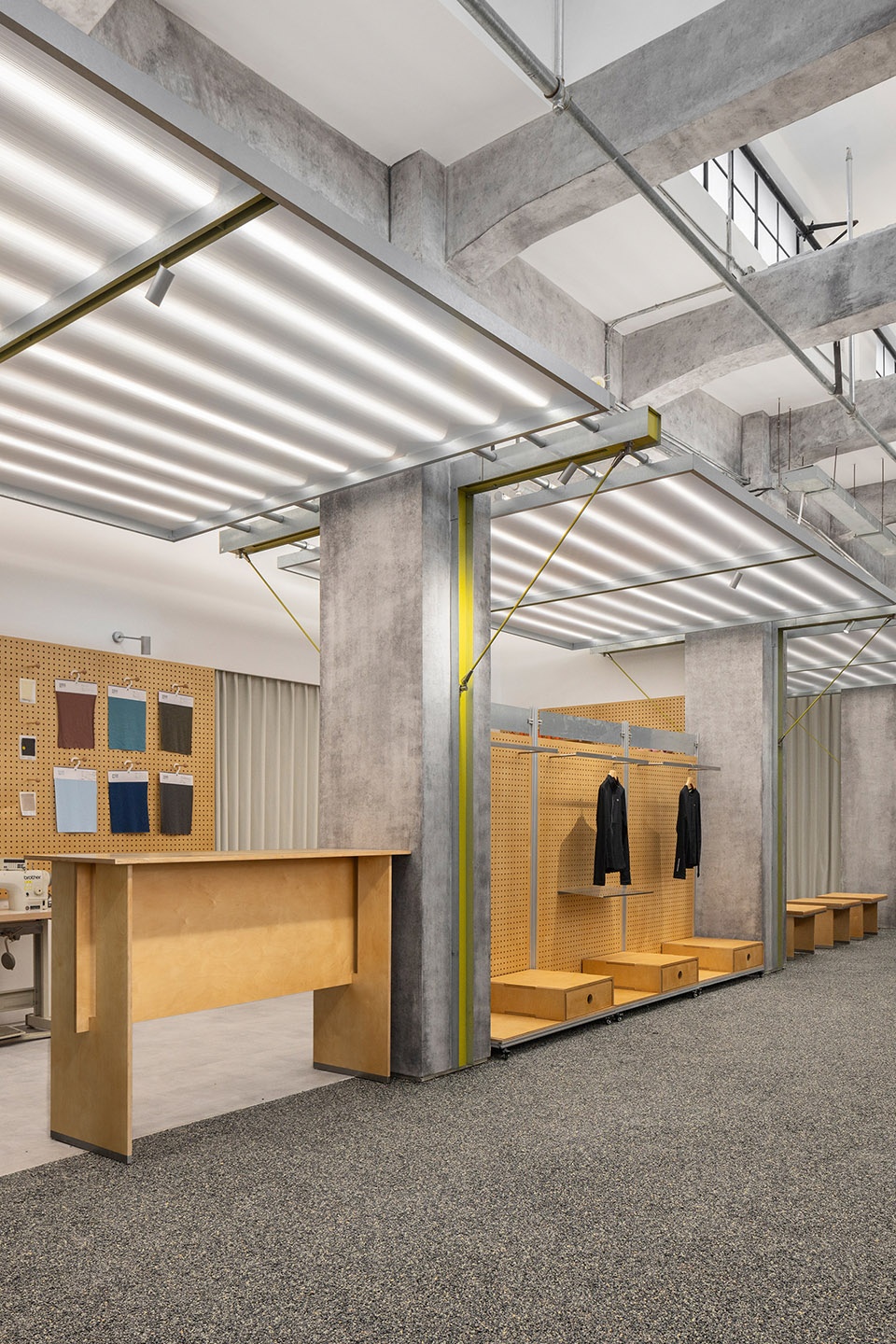 swiss outdoor apparel brand showroon hq by aam architects