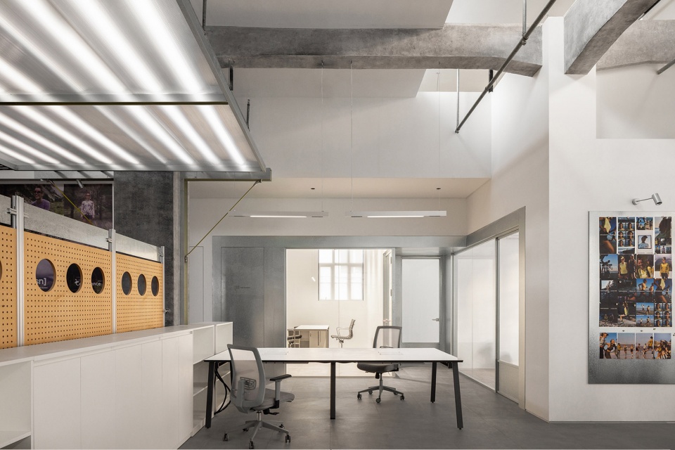 swiss outdoor apparel brand showroon hq by aam architects