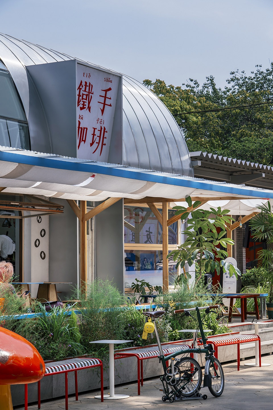 metal hands coffee youyi store by sa architects