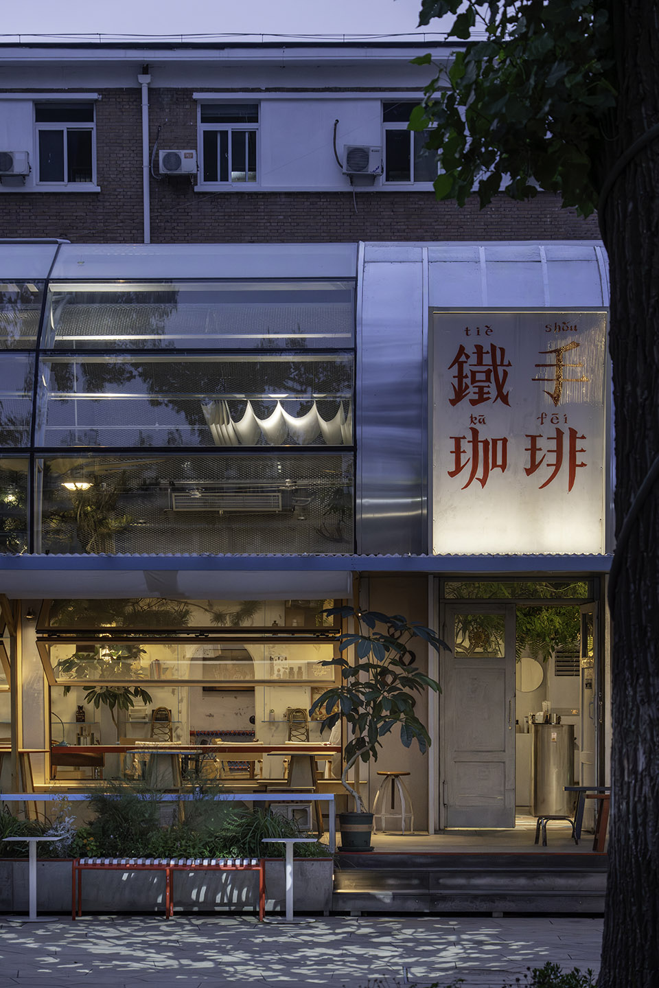 metal hands coffee youyi store by sa architects