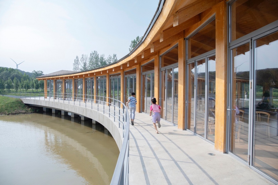 The Driftwood Village Center Xinyang by Primary Architects