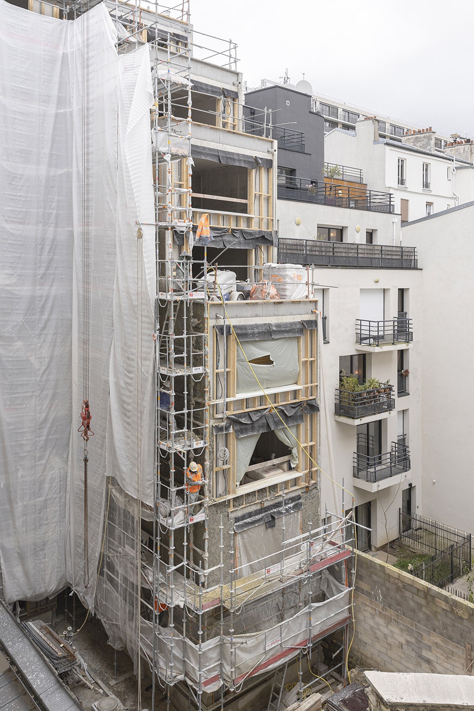 housing units in solid stone by mao architects