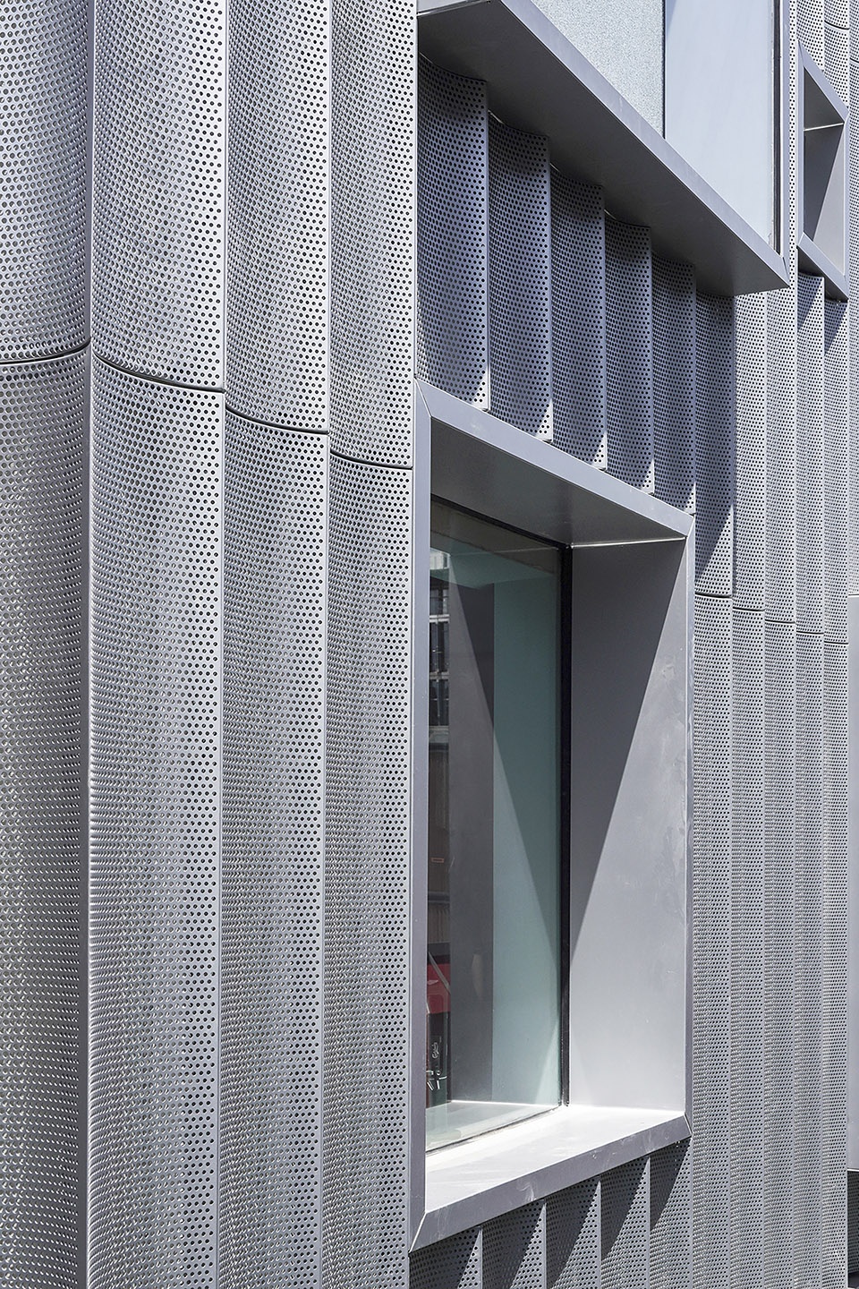 Facade and Public Space Renovation of the Street by moss architects