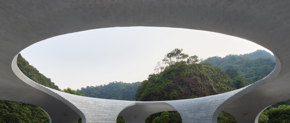 resting loop with views a creekside pavilion among hills by hcch studio
