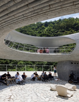 resting loop with views a creekside pavilion among hills by hcch studio