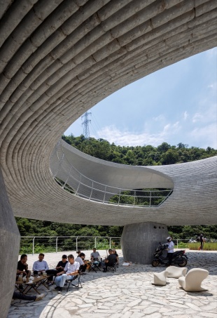 resting loop with views a creekside pavilion among hills by hcch studio