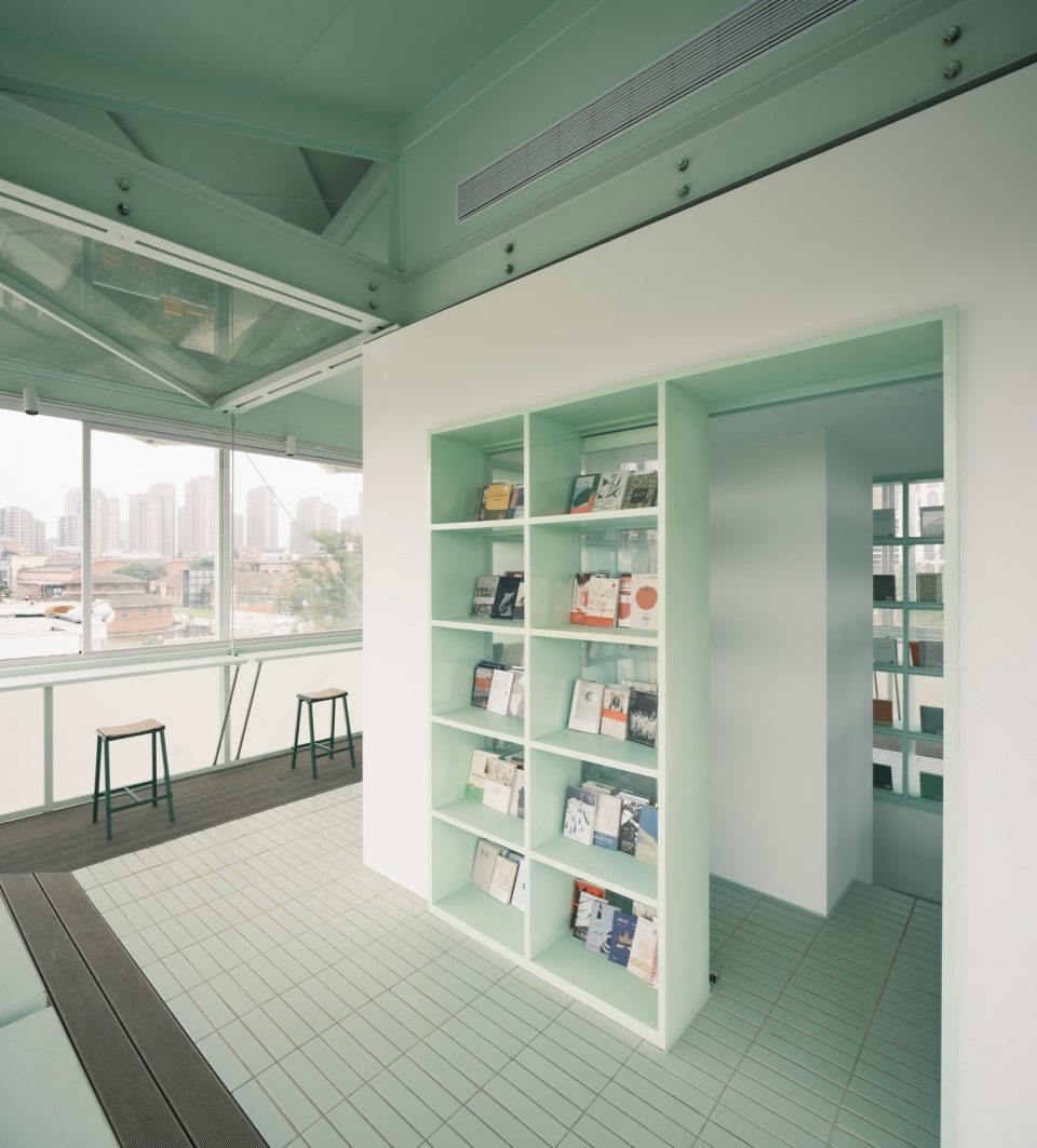 A Very Small 24 hour Bookstore by SZ Architects