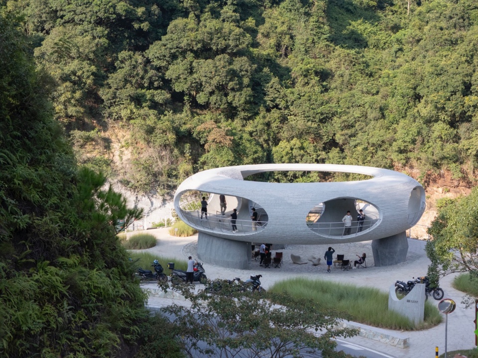 resting loop with views a creekside pavilion among hills by hcch studio