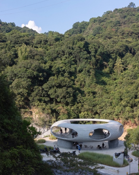 resting loop with views a creekside pavilion among hills by hcch studio