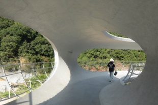 resting loop with views a creekside pavilion among hills by hcch studio