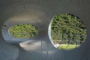 resting loop with views a creekside pavilion among hills by hcch studio