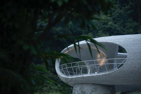 resting loop with views a creekside pavilion among hills by hcch studio