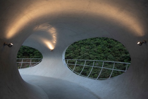 resting loop with views a creekside pavilion among hills by hcch studio